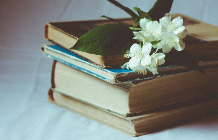 book stack white flowers