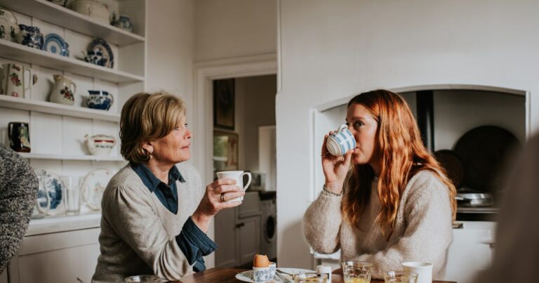 older woman sits beside