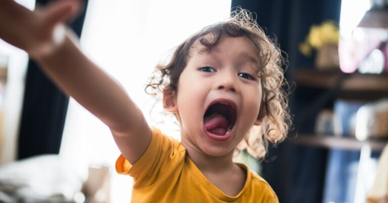 asian boy laughing